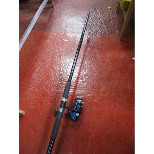 A Red Wolf beachcaster rod together a fixed