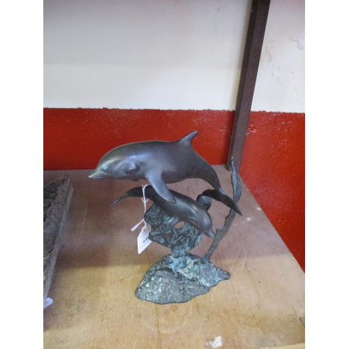 446 - A bronze of two dolphins