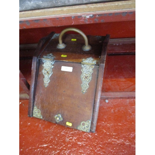 447 - An Edwardian walnut coal box with brass mounts