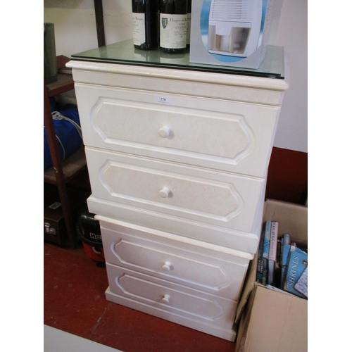 370 - A pair of mottled effect bedside chests of two drawers