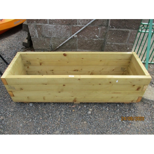 88 - A rectangular tanalised wooden garden planter - new