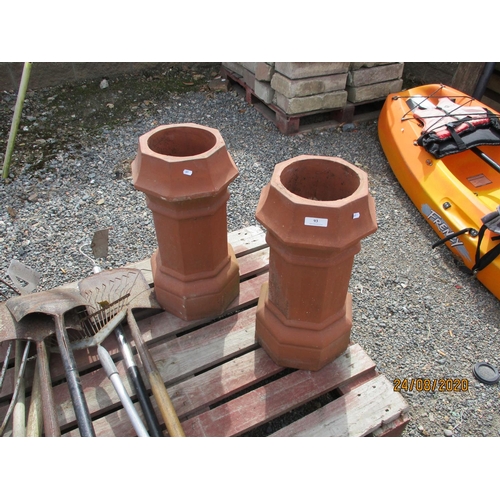 93 - A pair of terracotta chimney pots