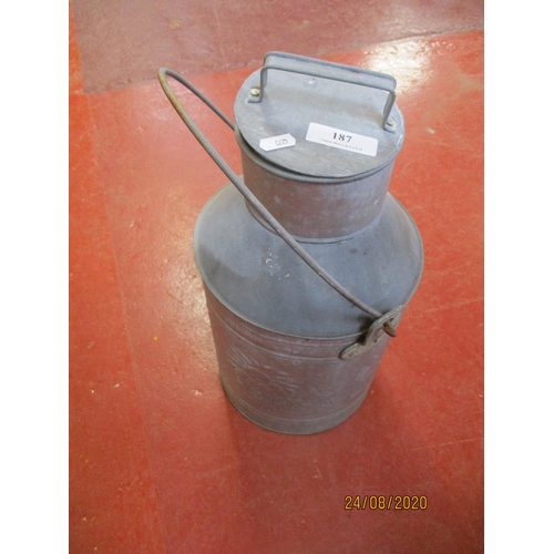 187 - A galvanised milk can and cover