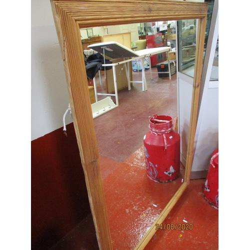 188 - A pine framed rectangular wall mirror