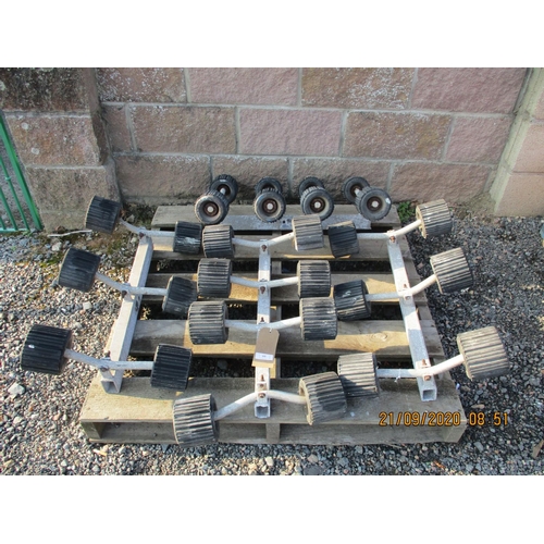 60 - Four sets of roller coaster boat trailer rollers