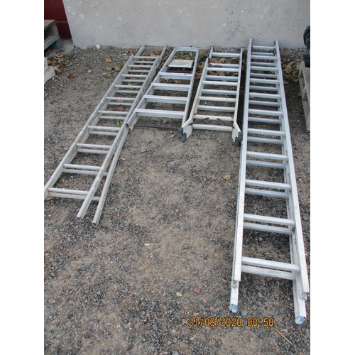 89 - An aluminium extension ladder, two combination ladders and an aluminium step ladder