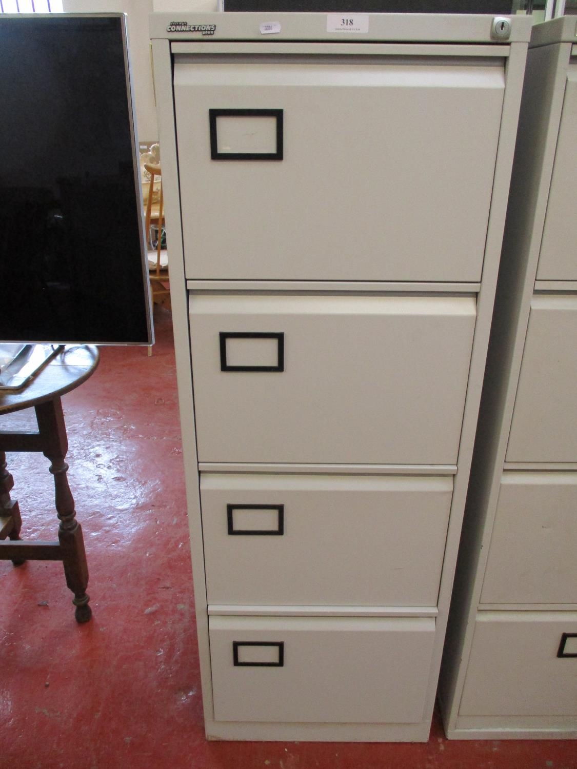 A Storage Connections Plus four drawer metallic filing