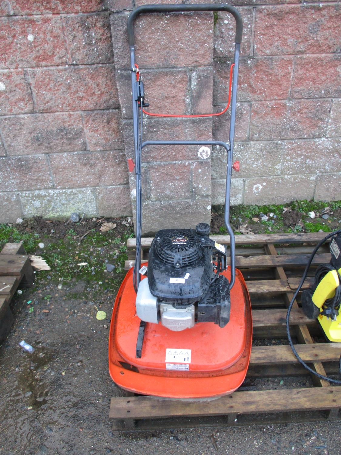 A Flymo XL500 Honda powered petrol hover mower