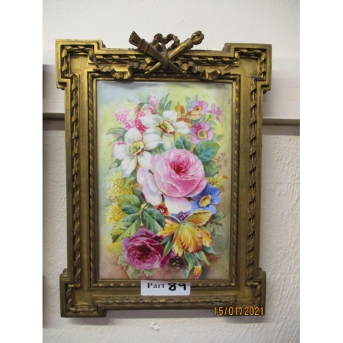 89 - A pair of gilt framed English plaques painted in colours with summer flowers on a mottled background... 