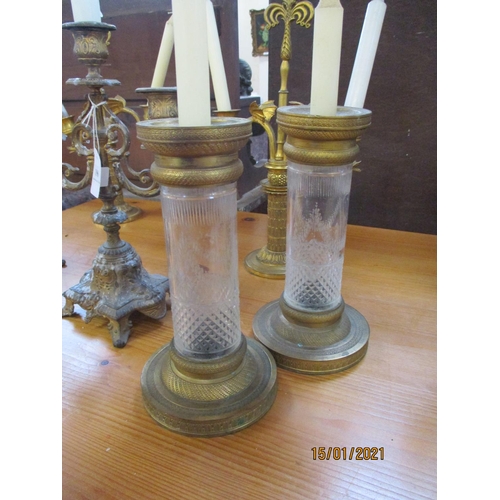 196 - Four pairs of ormolou candle sticks