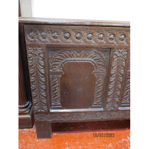 282 - A mid seventeenth century and later oak rectangular coffer the front with profuse carved decoration
... 