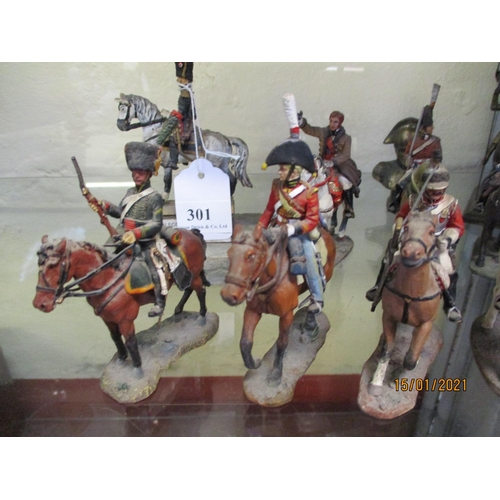 301 - A collection of Del Prado military figures together with three others