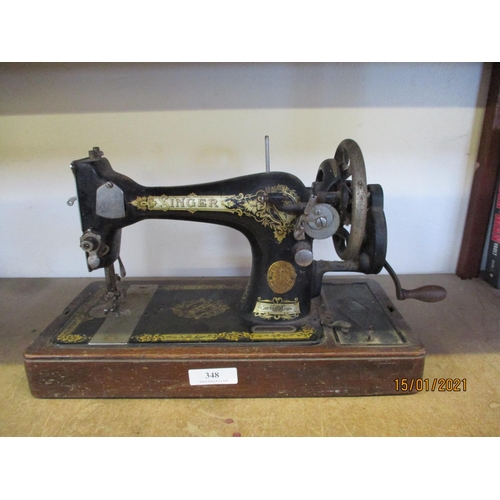 348 - A Singer hand portable sewing machine