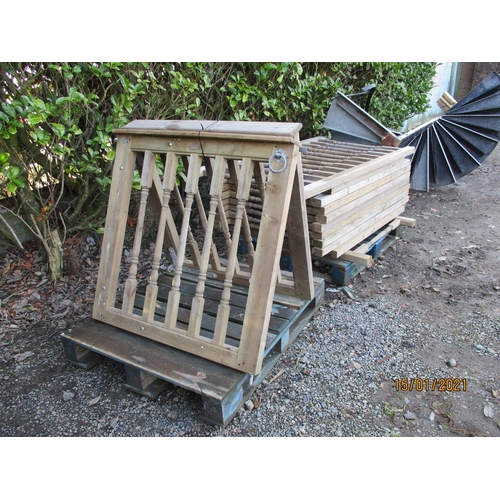 20 - Eleven wooden balustrade wooden fencing panels together with two matching gates