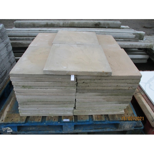 72 - A quantity of neutral coloured textured paving slabs