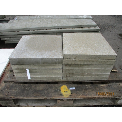 74 - A quantity of grey coloured paving slabs