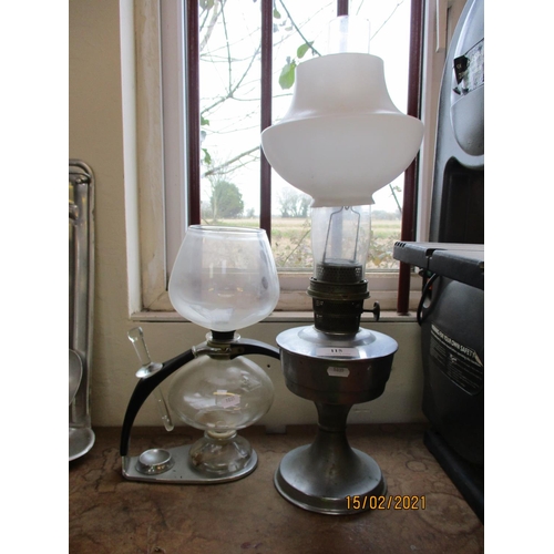 115 - A chrome paraffin oil lamp together with a Cona  vintage percolator