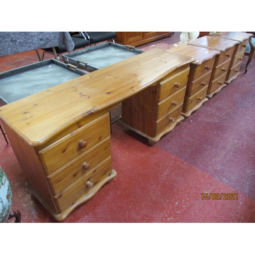 230 - A pine twin pedestal dressing table together with three matching three drawer bedside chests