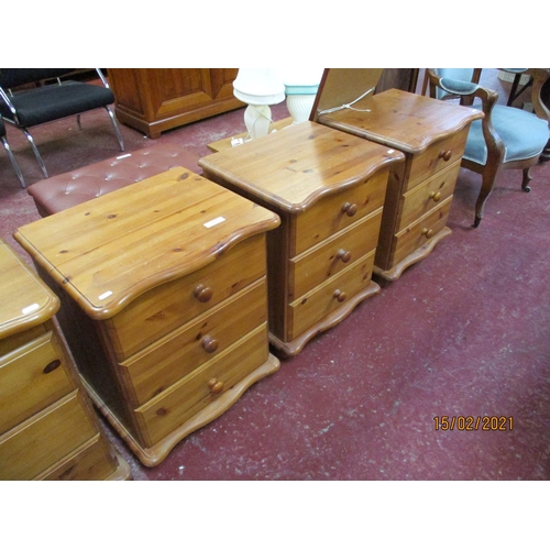 230 - A pine twin pedestal dressing table together with three matching three drawer bedside chests