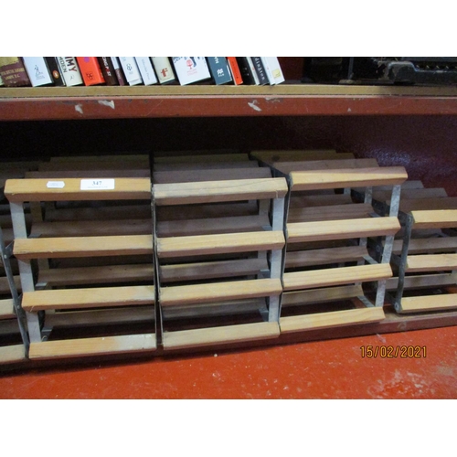 347 - Six wooden and metallic wine racks