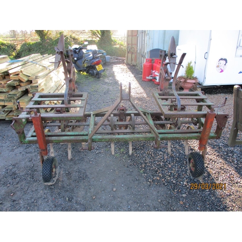 34 - A tractor mounted reworking frame