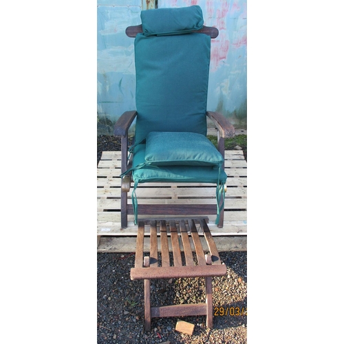 72 - A teak steamer chair complete with cushions