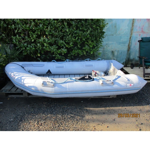 73 - An Avon 3.2m inflatable with alloy deck together with a Honda four stroke 2.3hp outboard engine