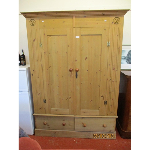 249 - A waxed pine double larder cupboard fitted two short drawers below