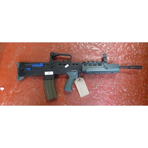 383 - An Airsoft assault rifle (internal fuse in need of replacement)