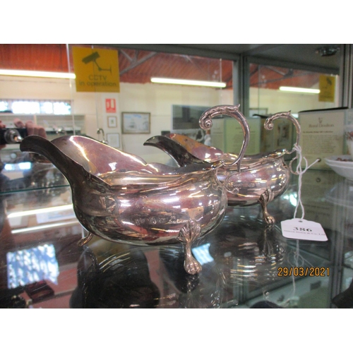 386 - A pair of silver sauce boats