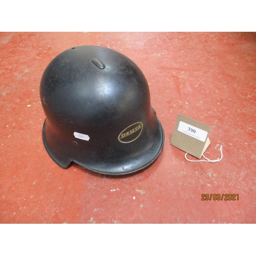 390 - A World War II German Deutz factory helmet (makers of marine and tank engines in Cologne) bearing we... 