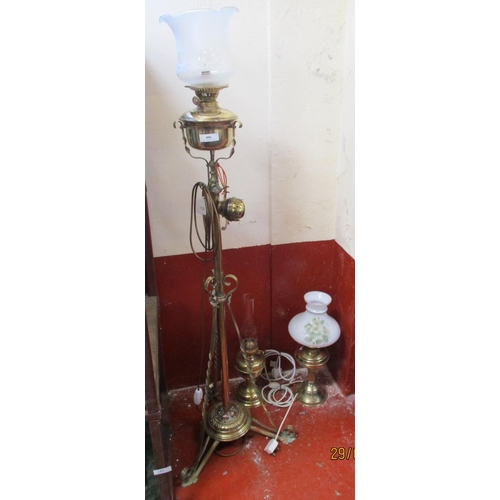 406 - Two vintage paraffin oil lamps and a similar standard lamp now all converted to electricity