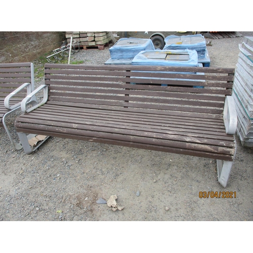 29 - A contemporary aluminium and teak garden bench