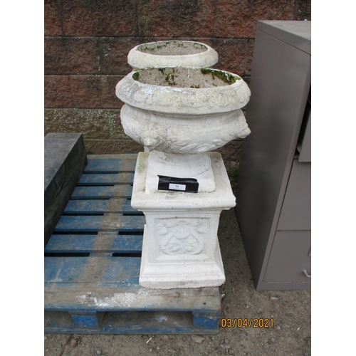 34 - A pair of vintage reconstituted stone circular stemmed garden urns