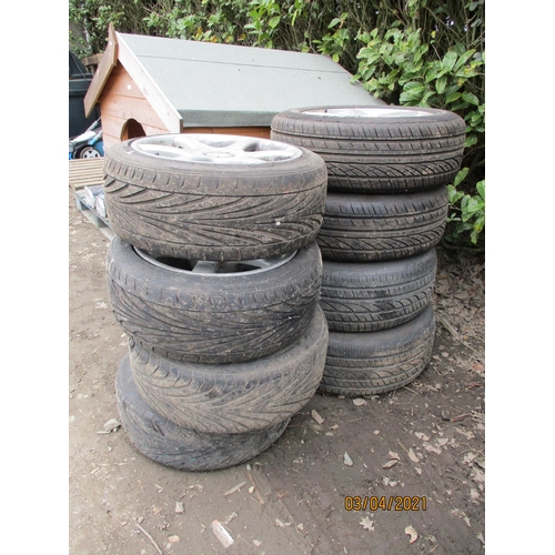 47 - A set of four Mercedes Benz AMG aluminium wheels and tyres (235/60R18) and a set of OZ racing alumin... 