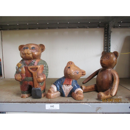 102 - Three wooden decorative teddy bears