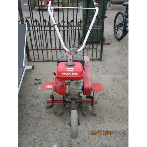 67 - A Honda F315 garden cultivator