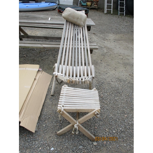 81 - An unusual teak garden chair and matching foot stool