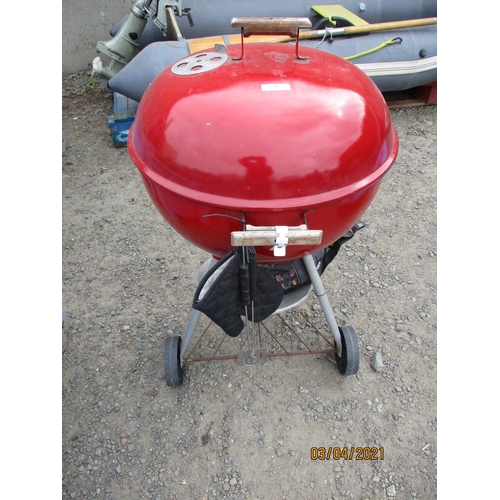 20 - A Weber kettle barbecue complete with charcoal