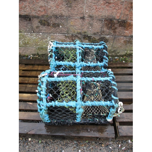 32 - Two parlour lobster pots