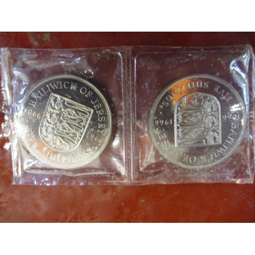 193 - Several cased sets of Royal Mint Jersey 1966 five shilling coins