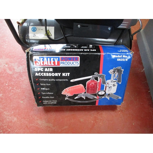 97 - A Sealey Air Power 24 litre capacity portable compressor together with an air accessory kit