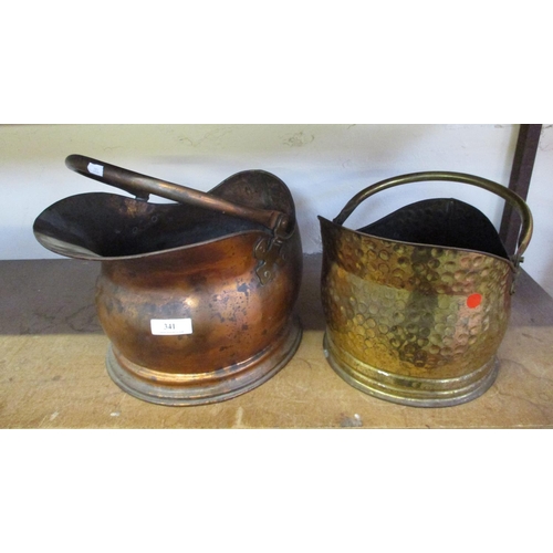 341 - A copper coal scuttle together with a beaten brass coal scuttle