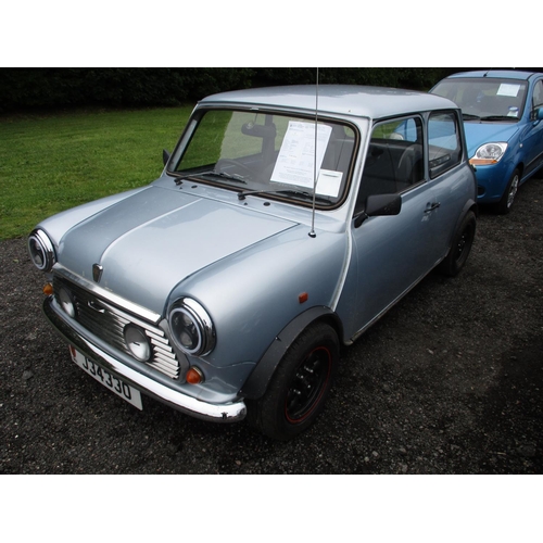 3 - A 1993 Rover Mini Sprite 1275 two door saloon (automatic) J34330, odometer reading 31,946 miles