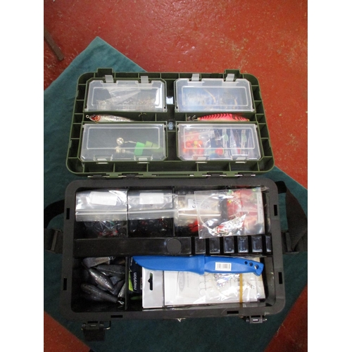 348 - An accumulation of new fishing tackle contained within a tackle box