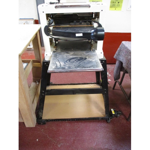 237 - An Axminster CT330 portable planer thicknesser complete with floor stand