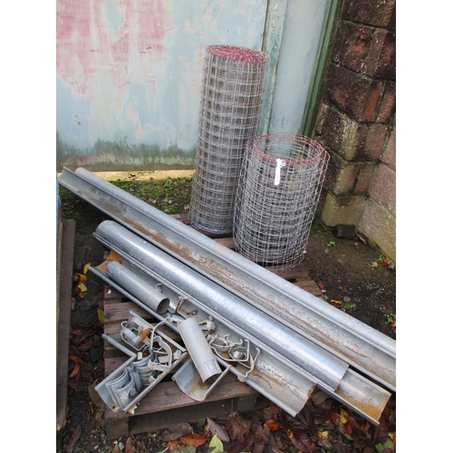 39 - A quantity of metal guttering together with various wire mesh