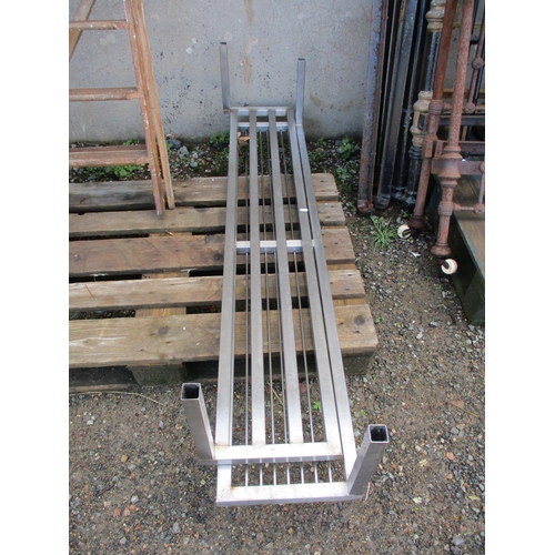 50 - A set of stainless steel shelves