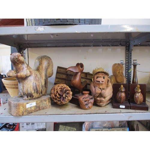 109 - Assorted wooden carvings, a fruit bowl etc.