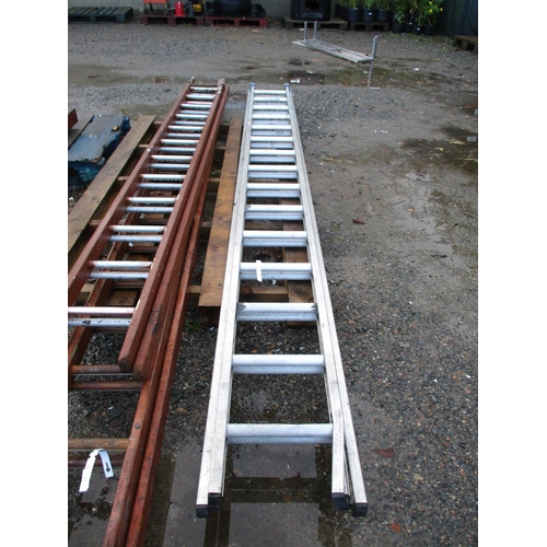 66 - An aluminium fifteen tread double extension ladder